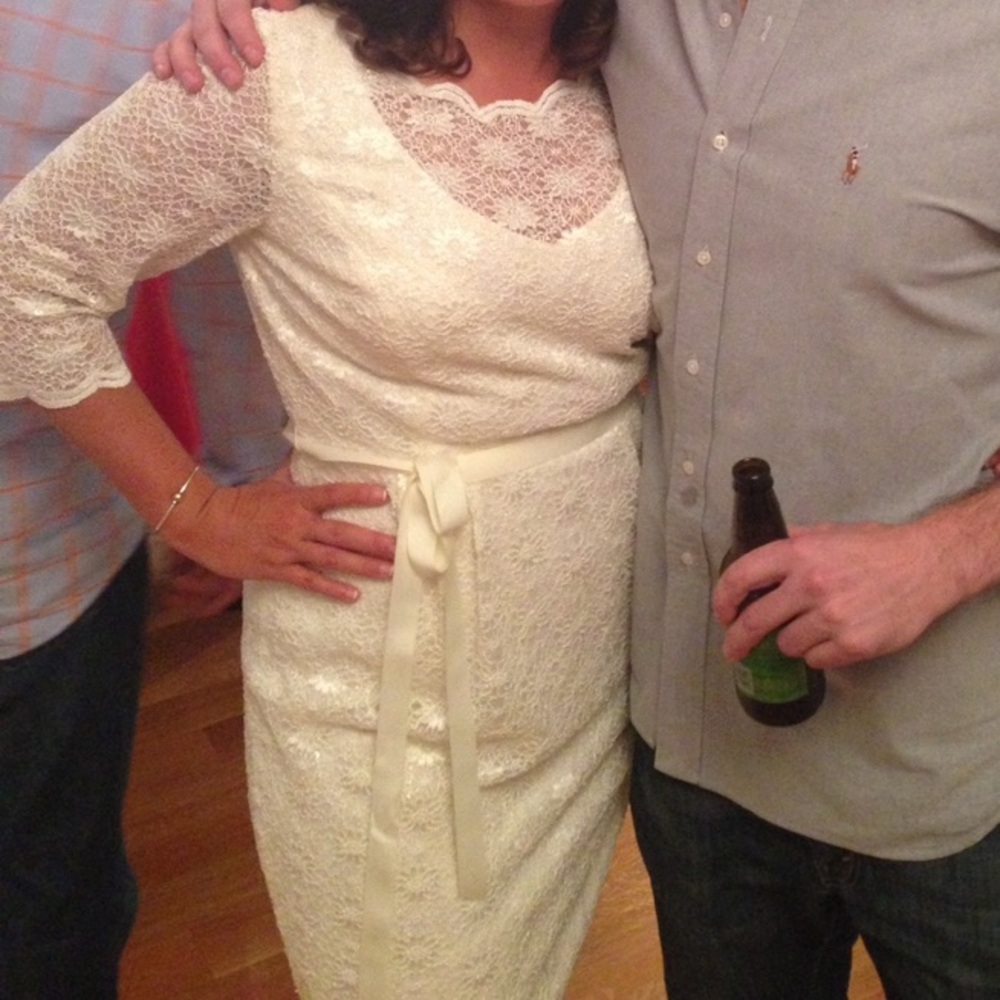 Beautiful slight sparkle cream dress. Size 12. Wore once for wedding rehearsal.